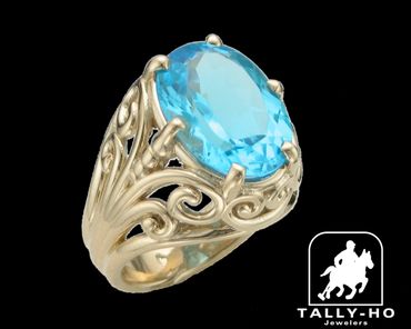 custom yellow gold blue topaz ring by tally ho jewelers