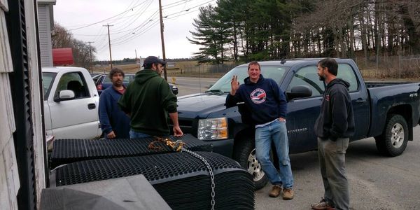 Four of our fishermen outside the store sharing the days adventures.