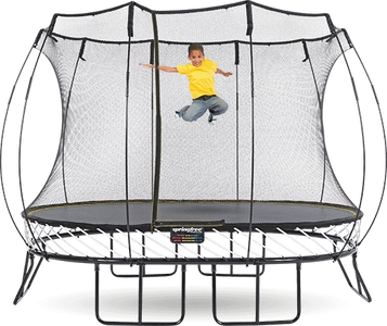 a boy in yellow t shirt is jumping on Springfree trampoline