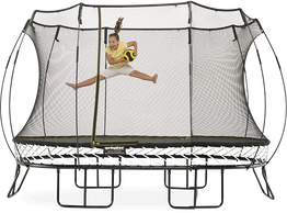 a little girl jumping on the Springfree trampoline