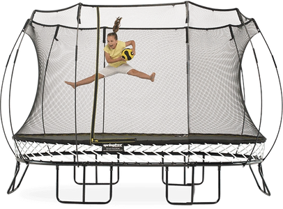 a little girl jumping on the Springfree trampoline
