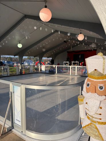 Portable rink boards and Christmas decorations in Adamsville.