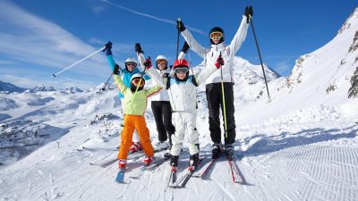A family on a private group ski lesson in Meribel