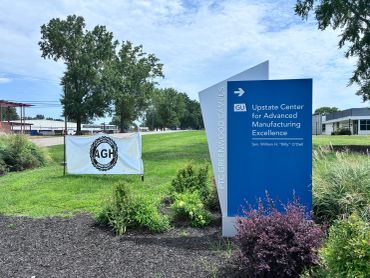 Sign for Upstate Center for Advanced Manufacturing Excellence outdoors.
