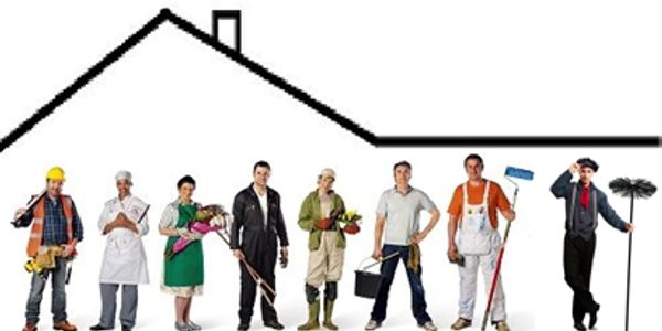Various professionals standing in front of a house outline.
