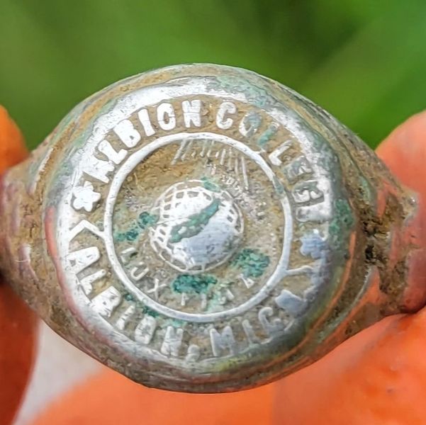 An Albion College class ring identified during archaeological investigation in Detroit, Michigan.