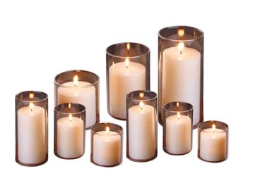 Clear glass hurricane vases: LED pillar candles, wedding aisle lighting, Scotland event hire.