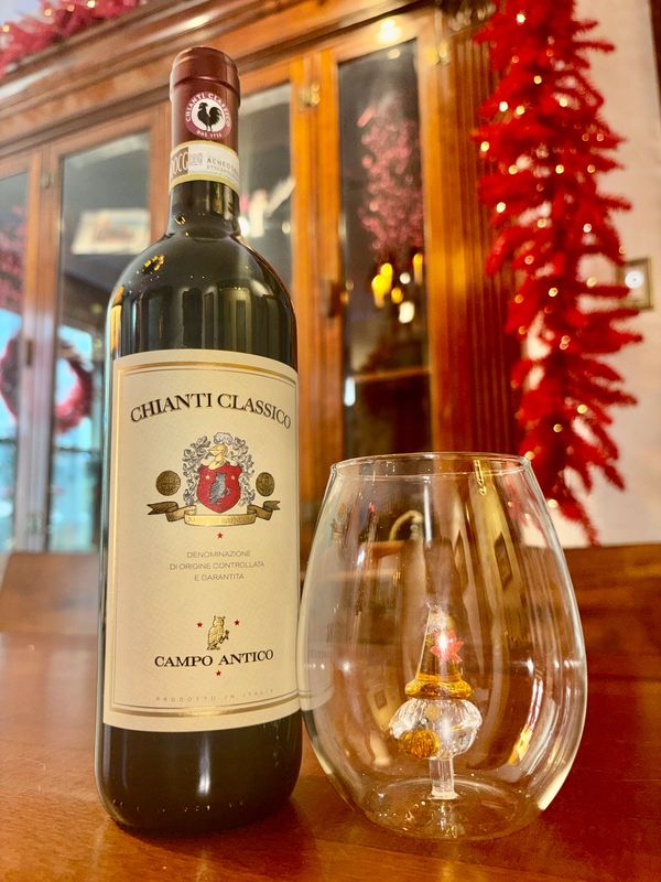 Jersey Art Glass wine glasses. Clear with a  Gnome Center.