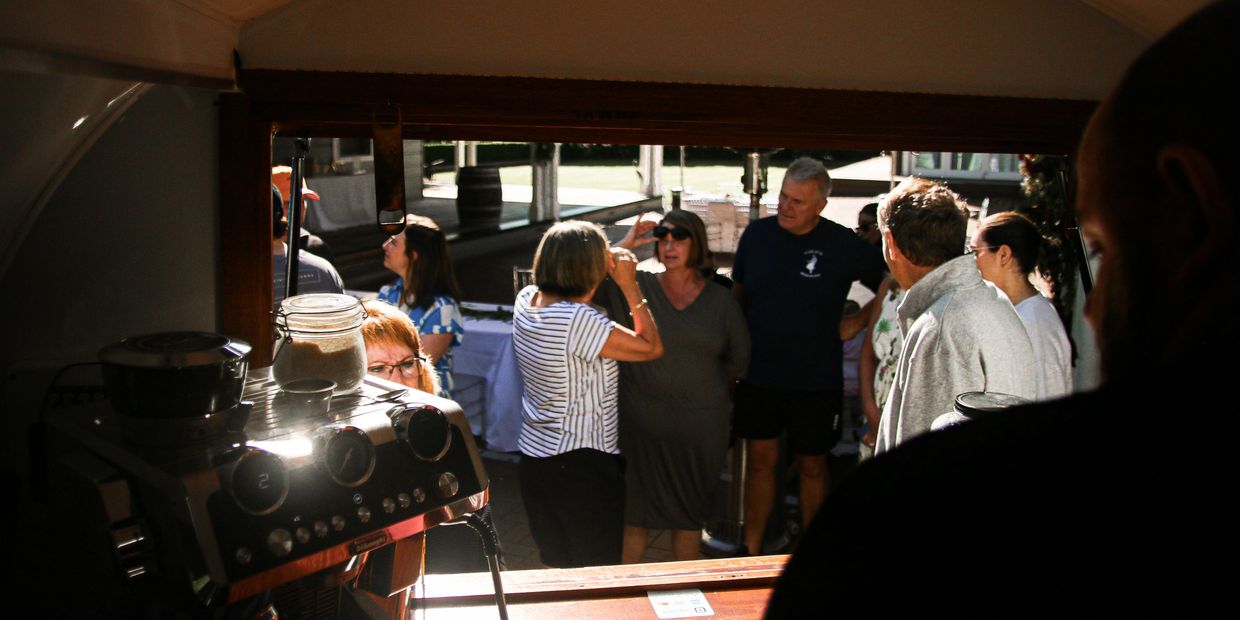 Happy guest after wedding morning with a cup of coffee