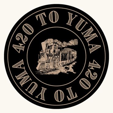 Vintage steam locomotive with "420 TO YUMA" text in a circular design.