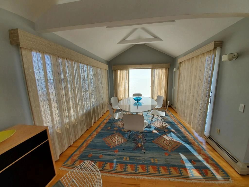 Horizon Averte woven vertical application. Cape cod woven. Roman shades cape cod