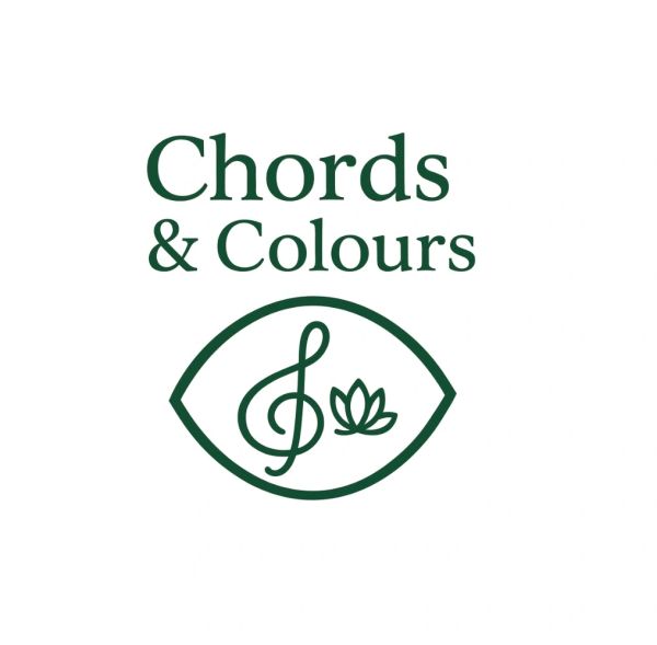 Logo with text 'Chords & Colours' and a treble clef with a lotus inside an eye shape.