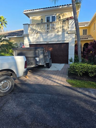 Dumpster parked on a job site offering affordable dumpster rentals with same-day dumpster rental service for construction and cleanup projects