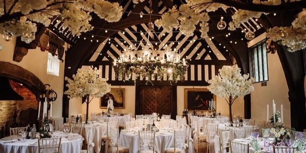 Wedding venue decoration with cherry blossom trees, Samlesbury Hall
