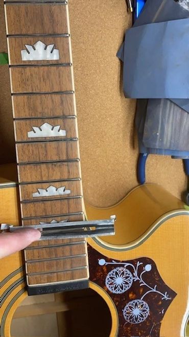 Nathan came to us with a request to setup his Epiphone EJ200 and reduce the playing action setup!