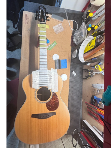 Gerry Hogans Patrick James eggle Gigging guitar Fret level crown and polish