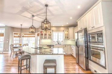 Kitchen Refresh, new counter tops, lighting & backsplash brought seller $40,000 more !