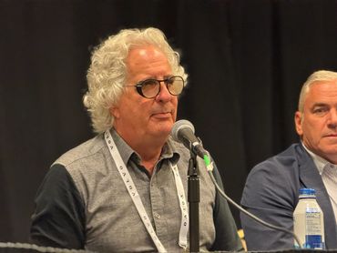 A panelist shares an emotional stoyr of the loss of his daughter on the PCH Highway into microphone