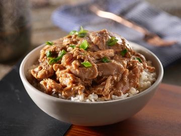 Bourbon Chicken Bowl, smothered in our sweet & buttery brown sauce over steamed white rice.