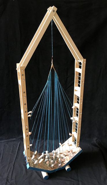 Wood,porcelain, embroidery thread, wishbone and nails