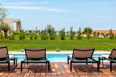 Beach area with seats for ten people