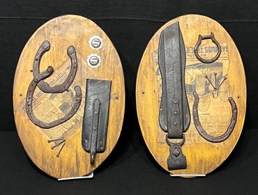 Set of 2 Cowboy Folk Art Oval Memorabilia and Two Rusty Hand Forged Horse Shoes