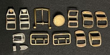 12 Partial/Full Silver, Nickel, Bronze, and Brass Belt Buckles