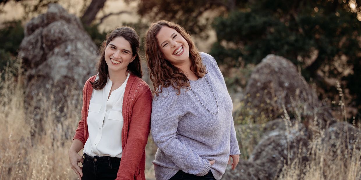 Kate Allen Fox and Gennie Gorback smiling in a nature setting.