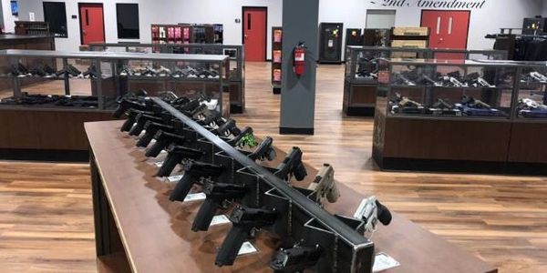 Try before you buy guns on retail display
