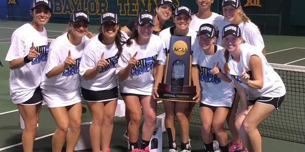 Female tennis players win trophy after  Rolfing by James Donatelli, Pain Relief Palm Beach, FL.