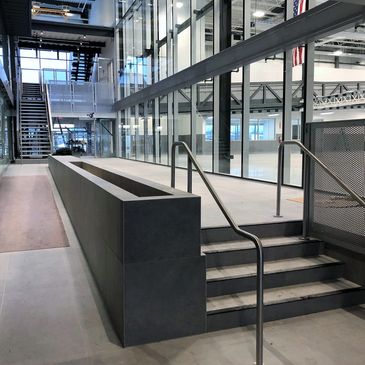 Empty planter bed in atrium