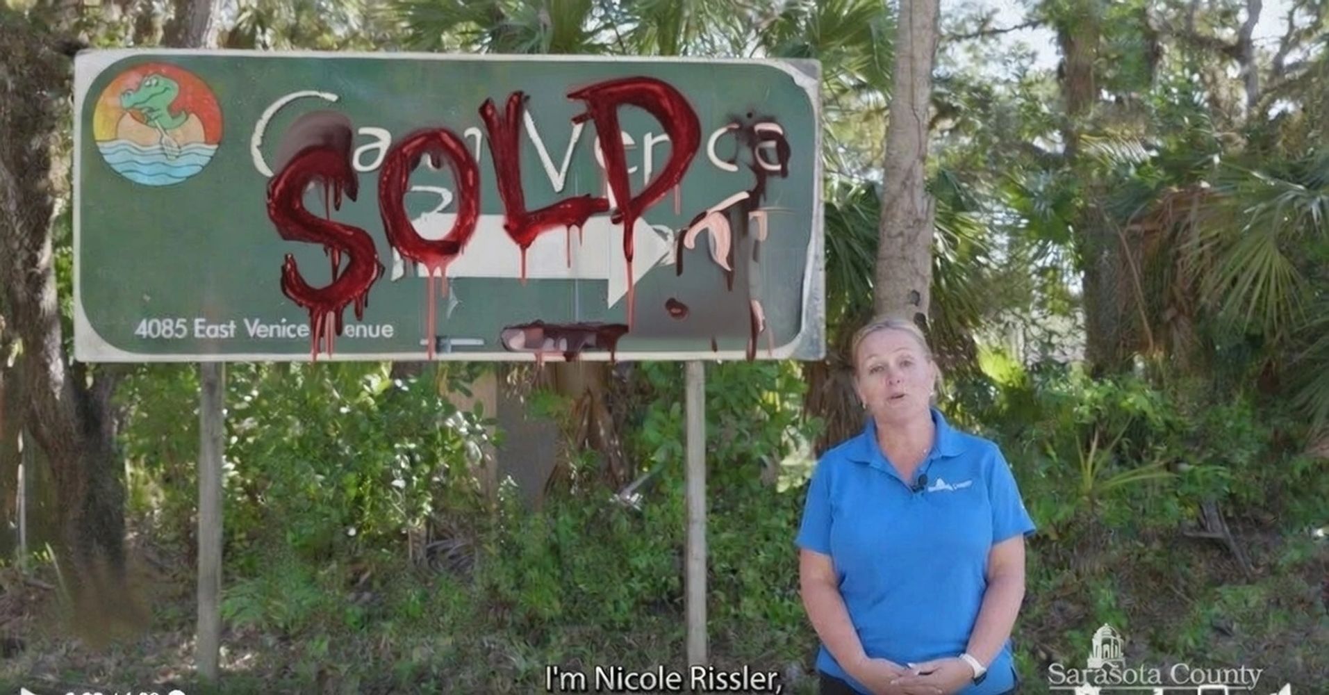 Nicole Rissler in front of Camp Venice Resort sign located at 4085 East Venice Ave, Venice FL