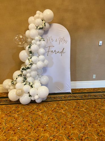 Personalized chiara with balloon garland.