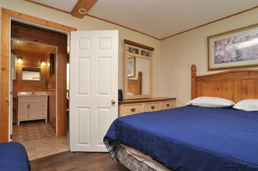 Cottage # 3 Bedroom 1 - Queen Bed & Set of Bunks (single on top / Dbl on bottom)