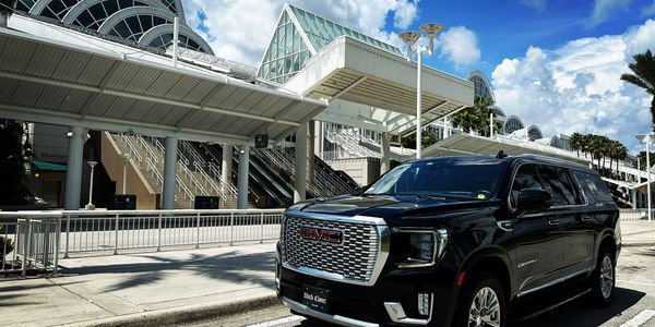 Black Clover Transportation| Black Car Services SUV after completing MCO Airport Transfer