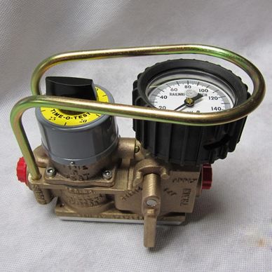 The Time-O-Test device is a rugged, compact package designed to withstand continuous use in a railro