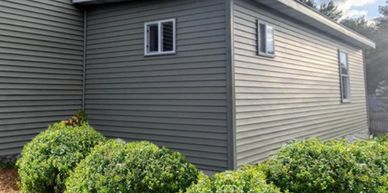gray vinyl siding on master bedroom suite home addition