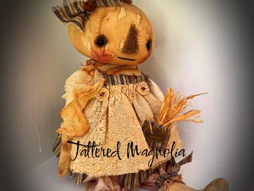 Handmade rag doll with a rustic look.