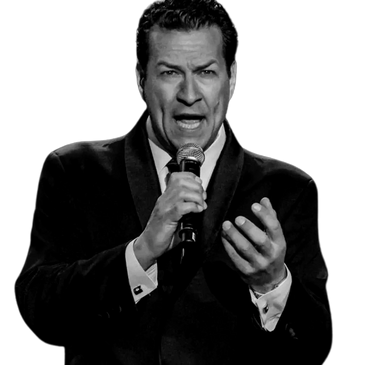 Lou Dottoli in classic suit singing live during black & white Sinatra tribute