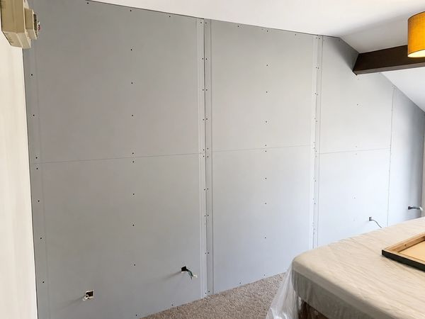 Double boarded soundbloc plasterboard fitted to soundproof wall in Scarborough, Filey