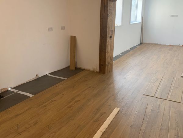Room renovation with oak flooring and feature beams completed in Scarborough, Filey and surrounding