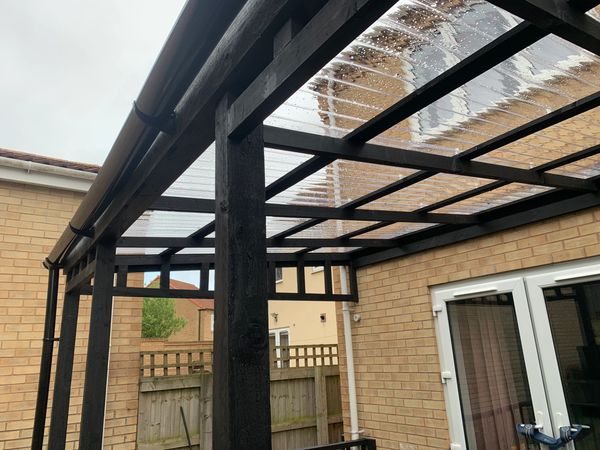 Gazebo roof upgrade with stormproof polycarbonate corrugated roof sheeting, new guttering