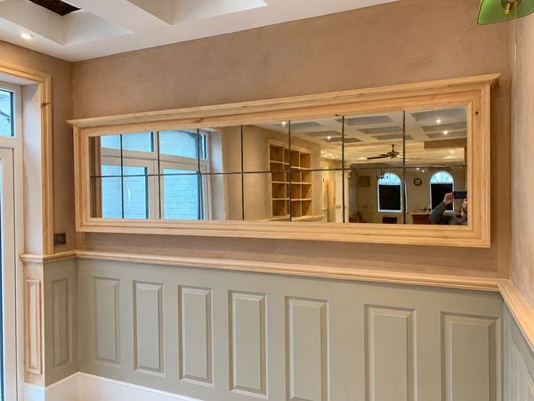 Bespoke mirror made from individual mirror tiles with decorative lead strip & a custom timber frame