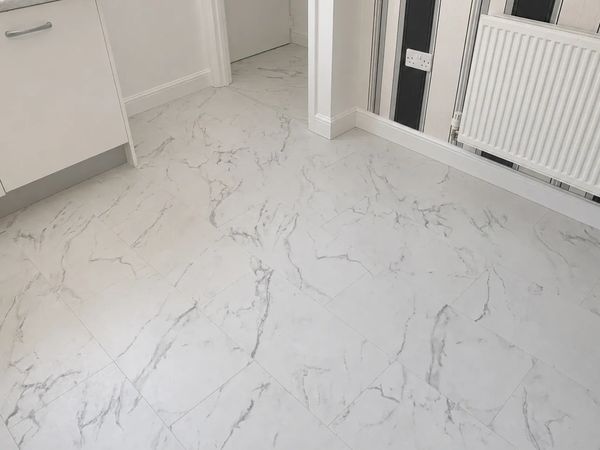 Completed marble effect laminate flooring installation in Scarborough, Filey surrounding village