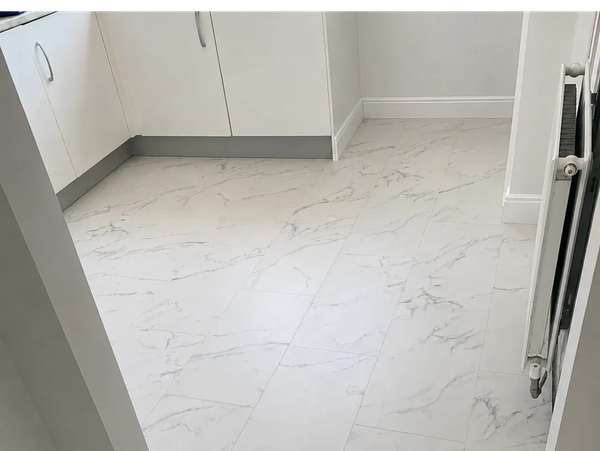 Completed marble effect laminate flooring installation in Scarborough, Filey & surrounding villages