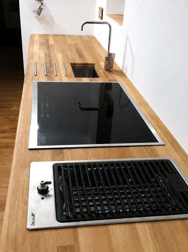 oak kitchen worktop with prep sink, induction hob and Smeg electric charcoal grill in Scarborough