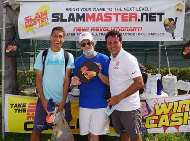 Pickleball Champion Zane Navratil with Gordon G.G. Gebert. Slam Master Pro booth Delray Beach Open
