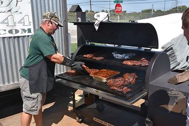 Ritch cooking at a Gator BBQ Class