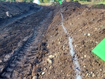 Swale off contour with slanted road/terrace