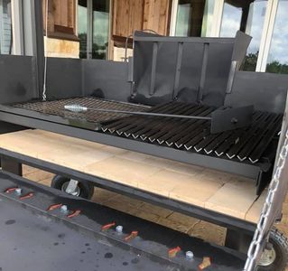 Drop down front on Santa Maria grill,